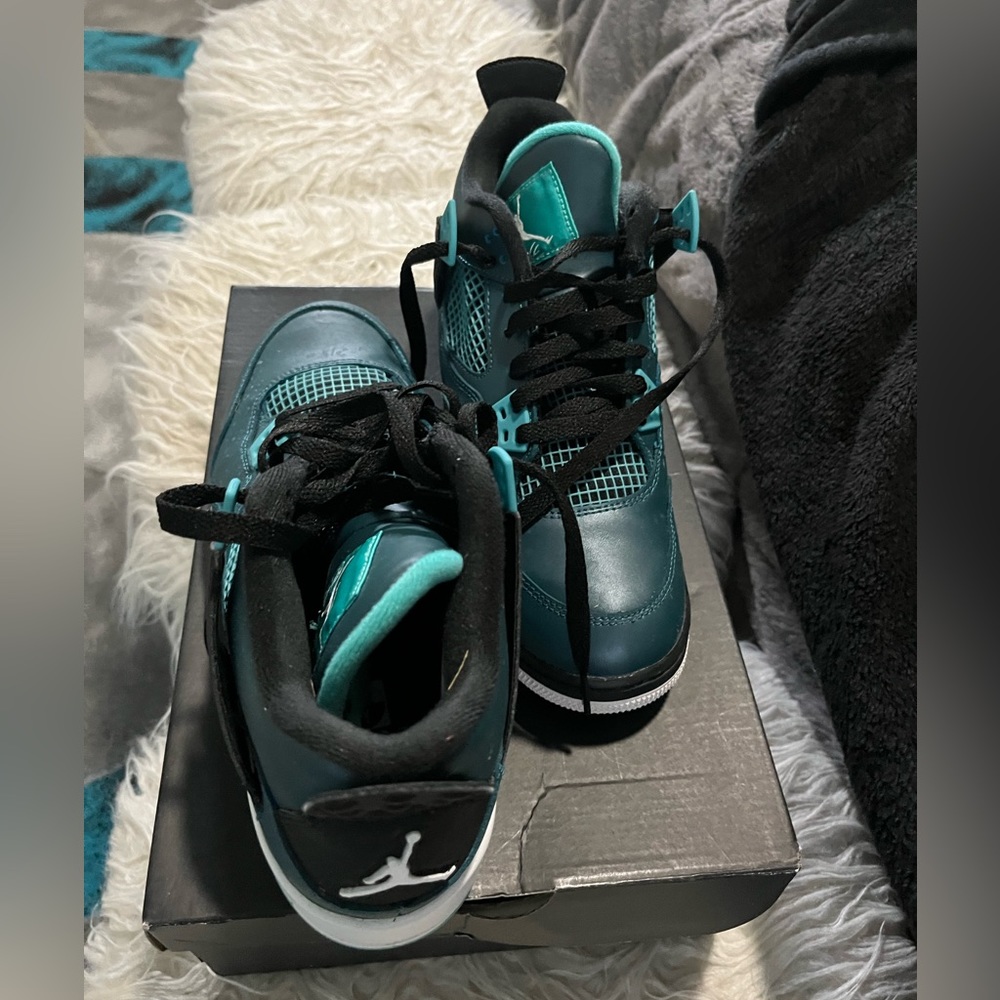 7 youth green and black Jordan’s